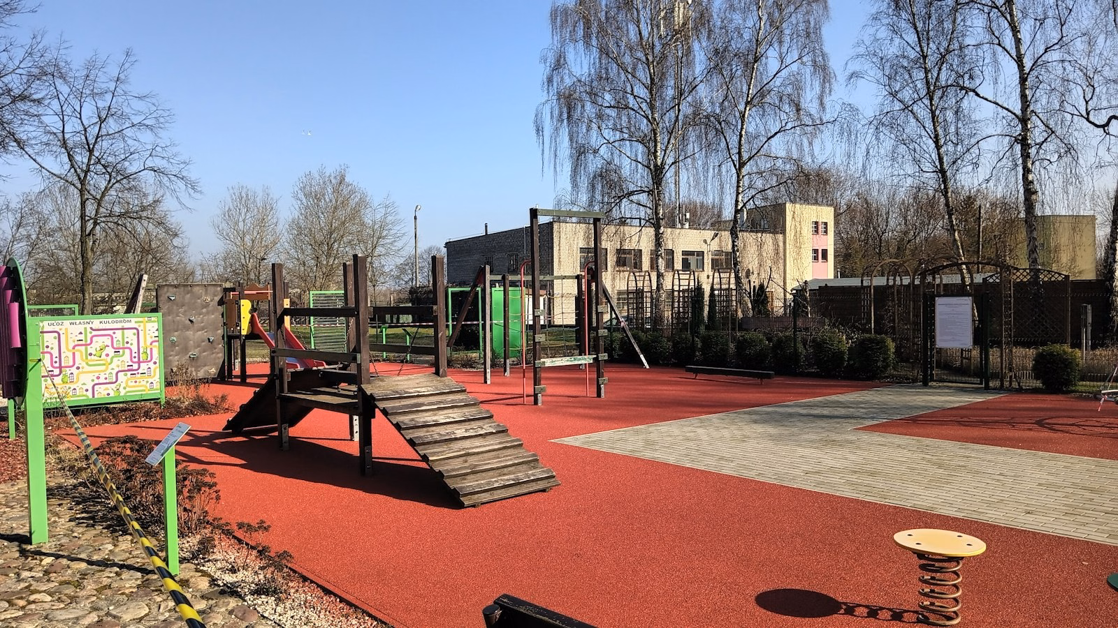 Children's playground with slide and climbing frame